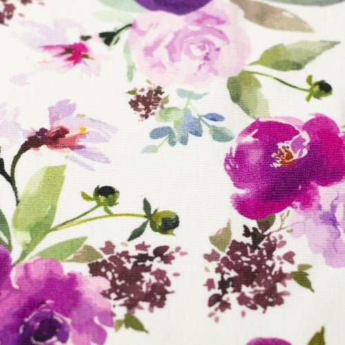 Baumwolljersey lila Blüten - Aron Swafing - Stoffmeisterei